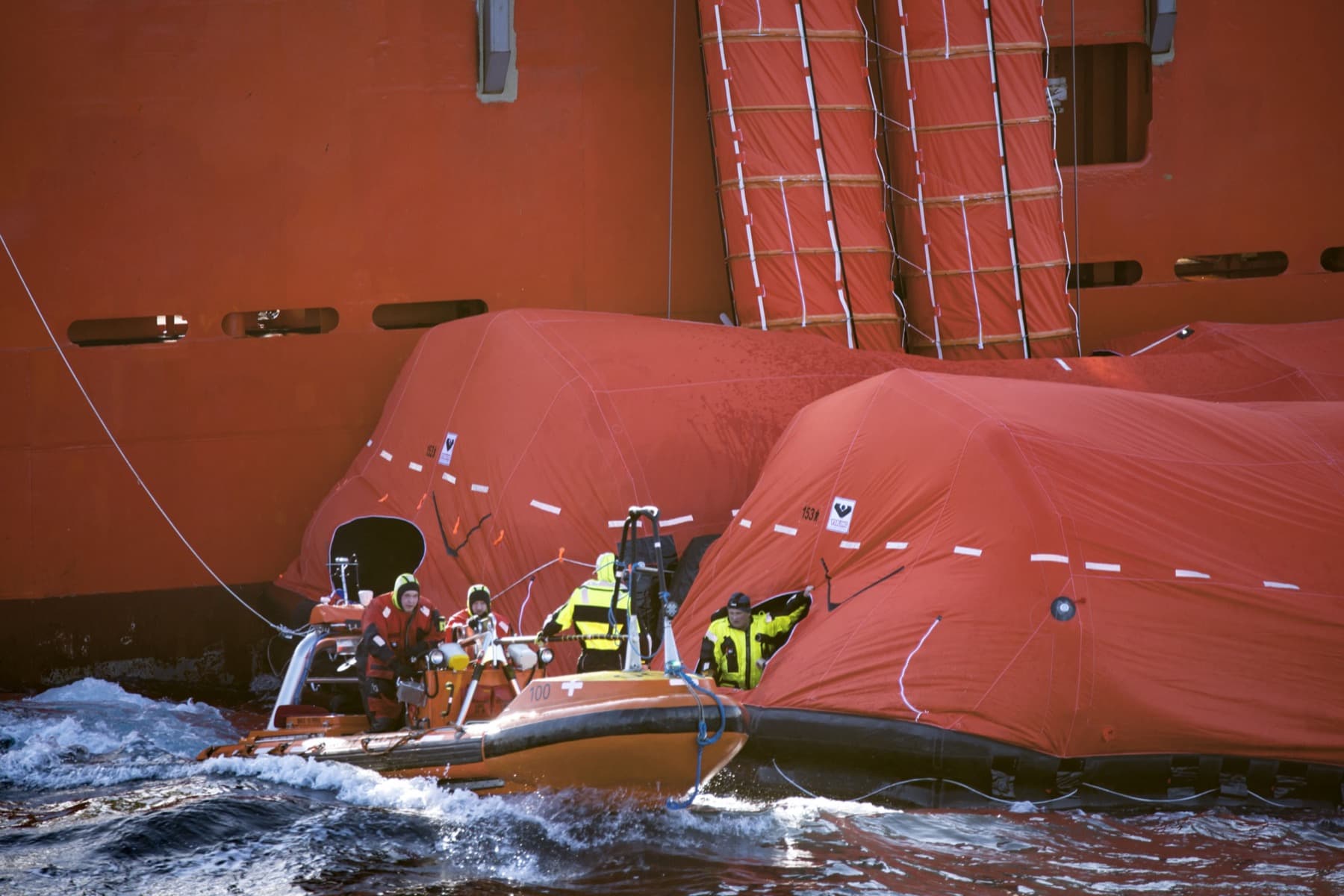 VIKING liferafts inflated beside a ship during a sea trial