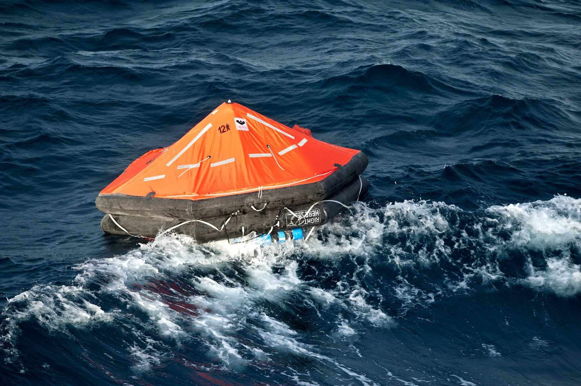 VIKING liferaft riding breaking waves in open water